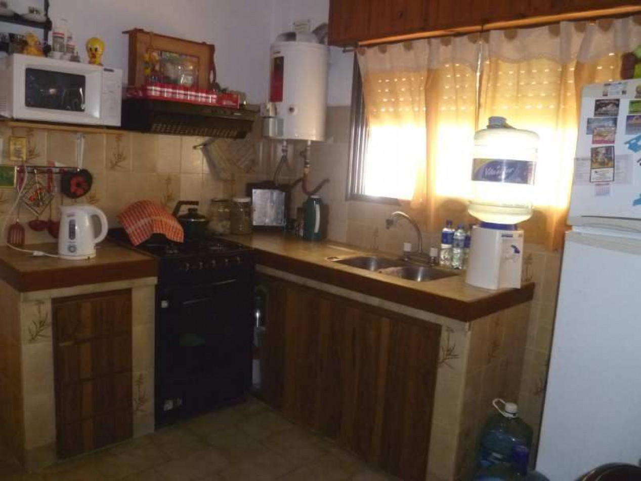VENTA EN BLOCK (CASA AL FONDO CON DPTOS AL FRENTE )